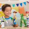 Child playing with Toy Story figurines in a colorful room
