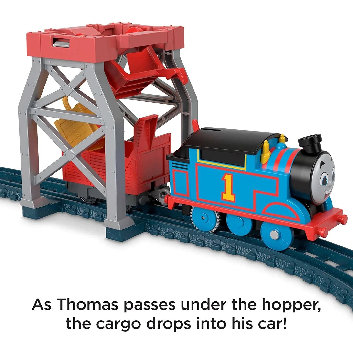 As Thomas Passes Under the hopper, the cargo drops into his car