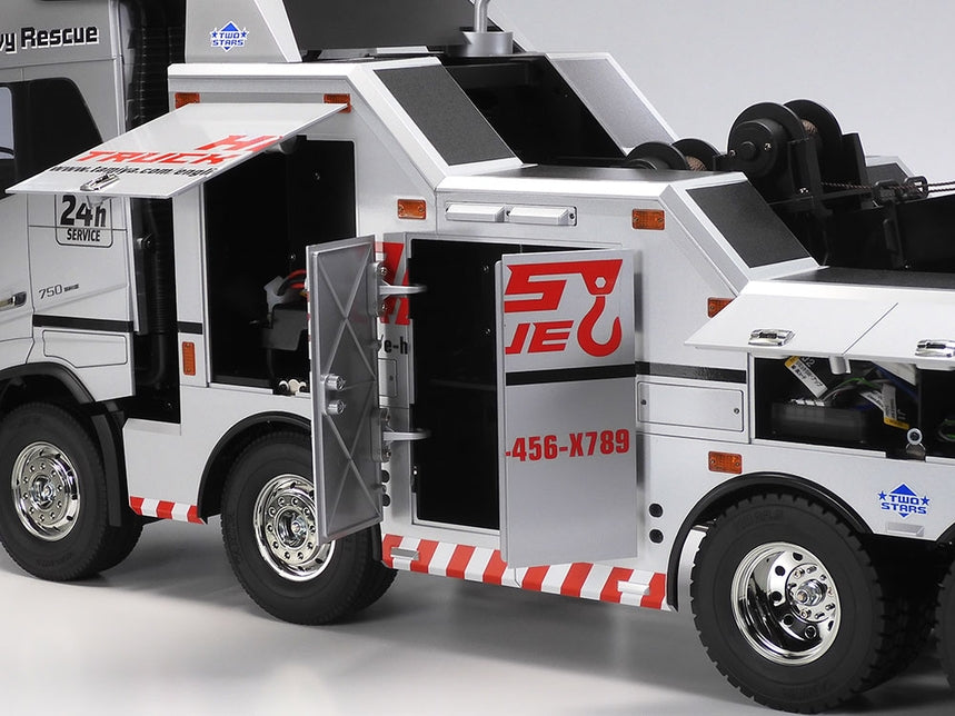 Tow truck with open doors on a white background