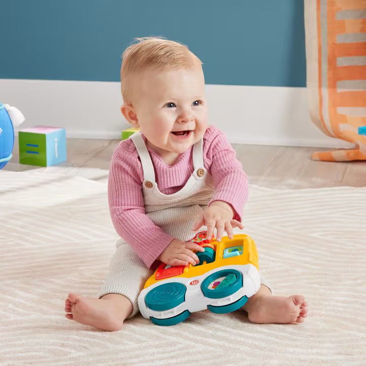 Colorful Fisher-Price Discovery Car toy designed for toddlers’ hands-on play