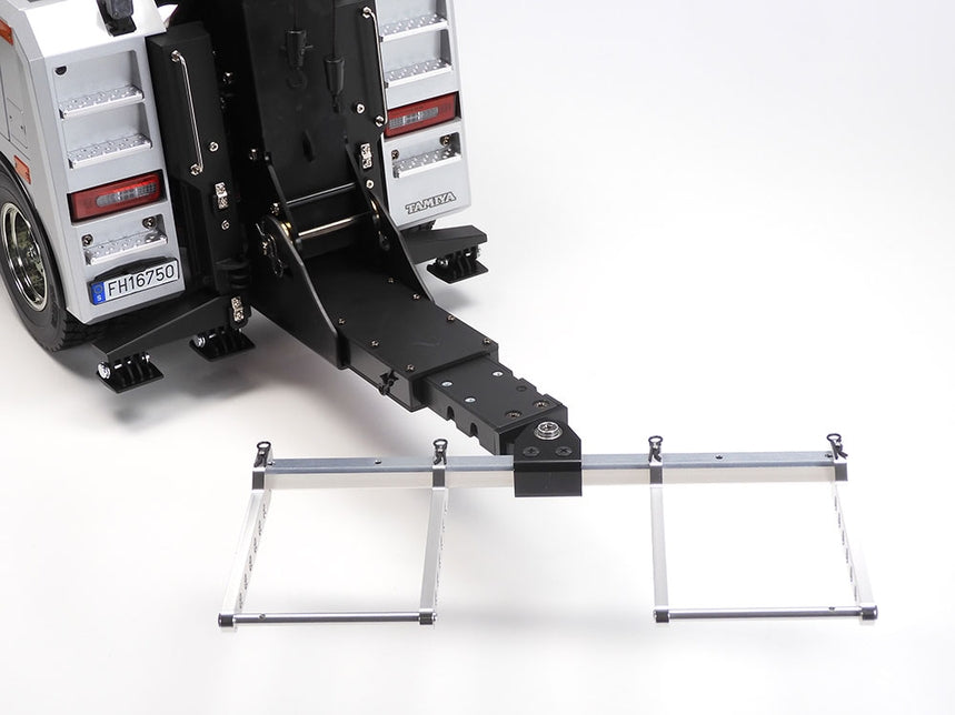 Trailer hitch with a ladder attached on a white background