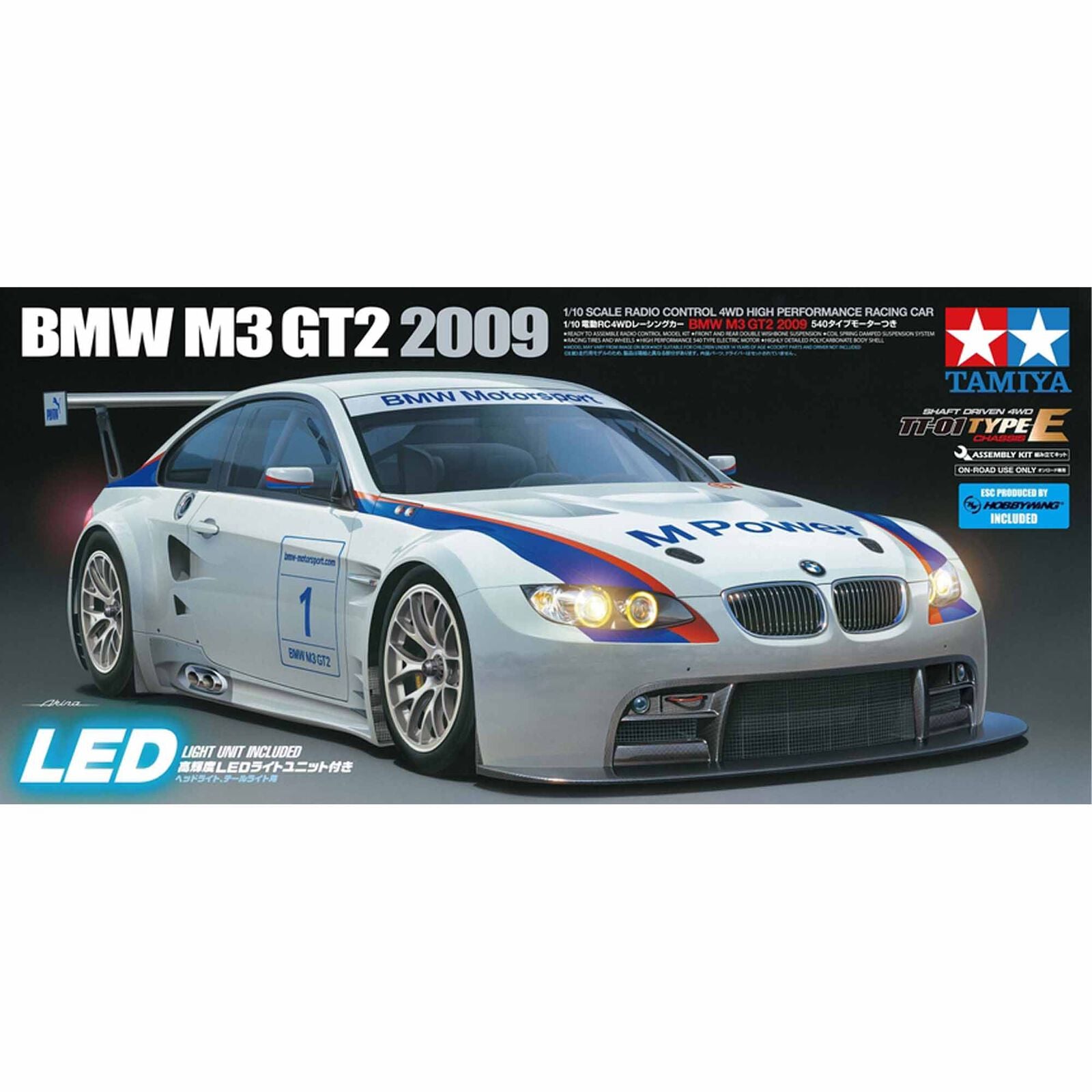 Model car kit of BMW M3 GT2 2009 with Tamiya branding on a white background