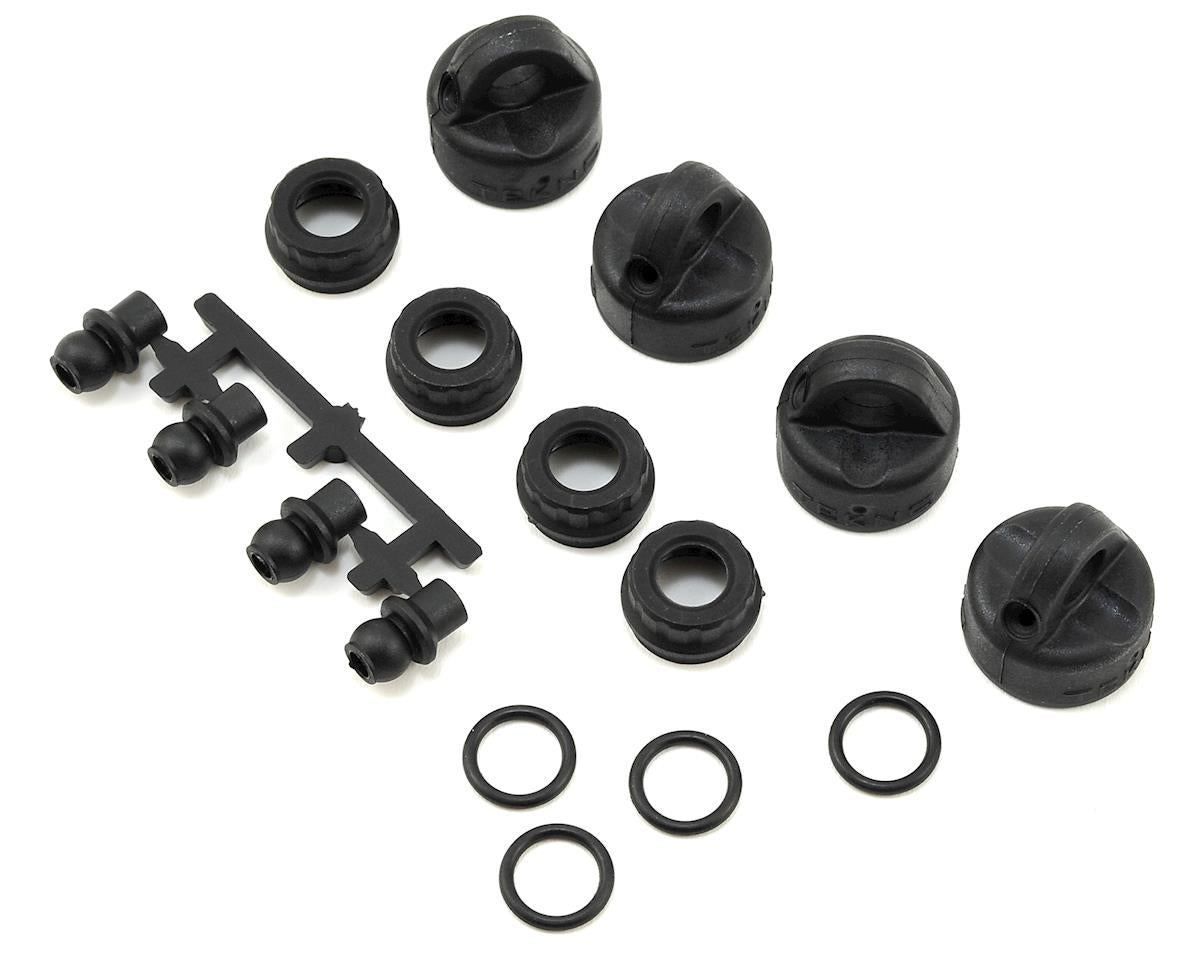 TKR6712 Tekno RC EB410/ET410 Shock/Cartridge Cap & Bushing Set (4)