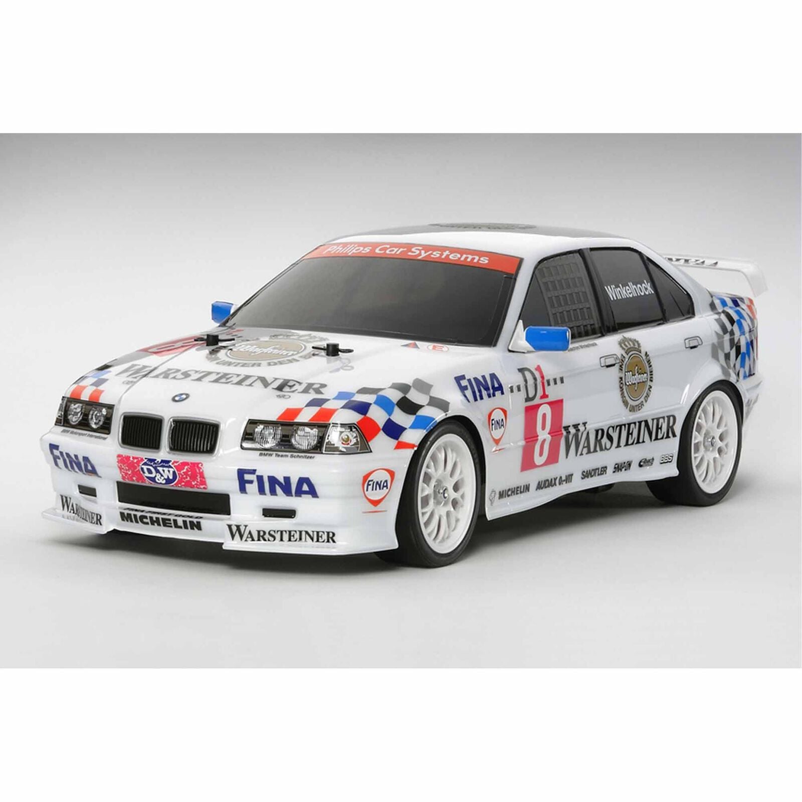 Model race car with various sponsor logos on a gray background