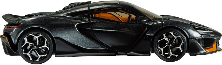 A black metallic toy sports car with orange interior accents and black-and-silver wheels, shown in a side profile on a white background.