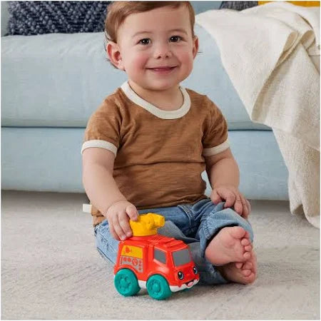 Adorable push-along fire truck with chimes and 360-degree rotating fire hose